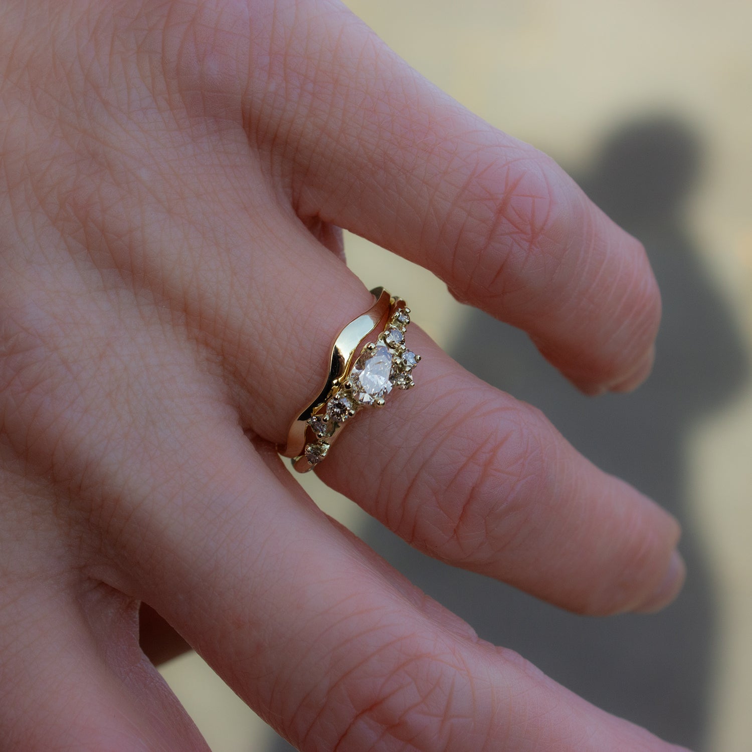 Organically shaped, flowy gold band. Paired with perfectly matching, champagne diamond ring.