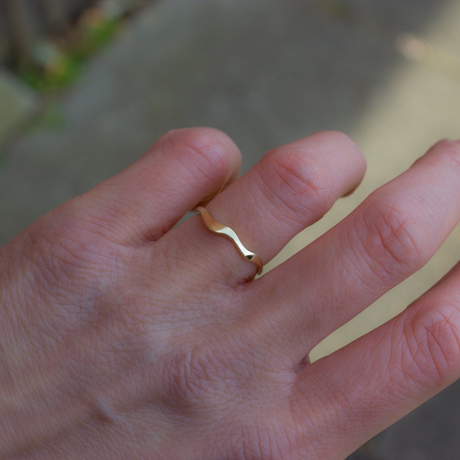 Organically shaped, flowy gold band. Perfect for stacking.