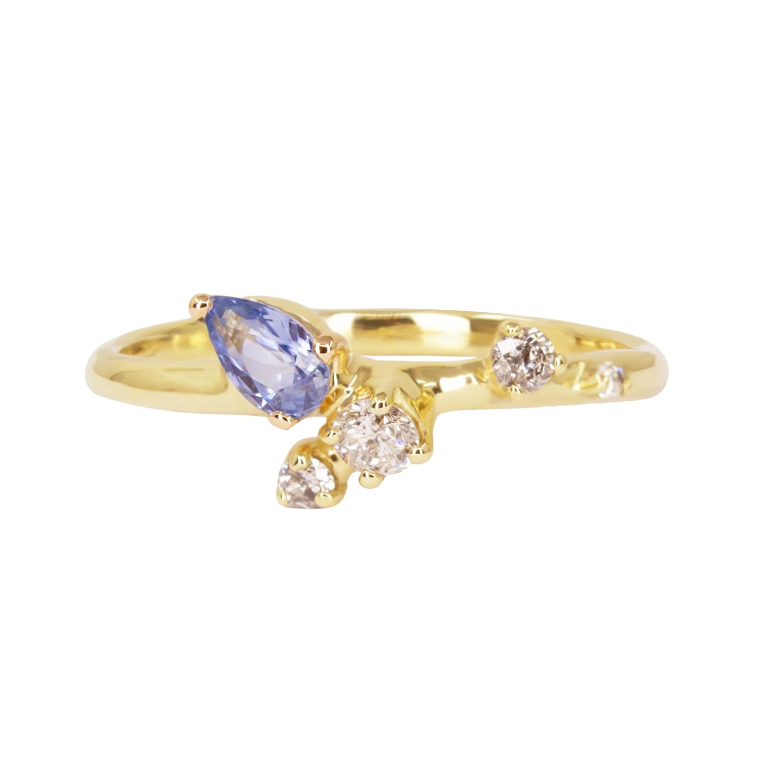 Gold ring with a purple gemstone and two diamonds on a white background
