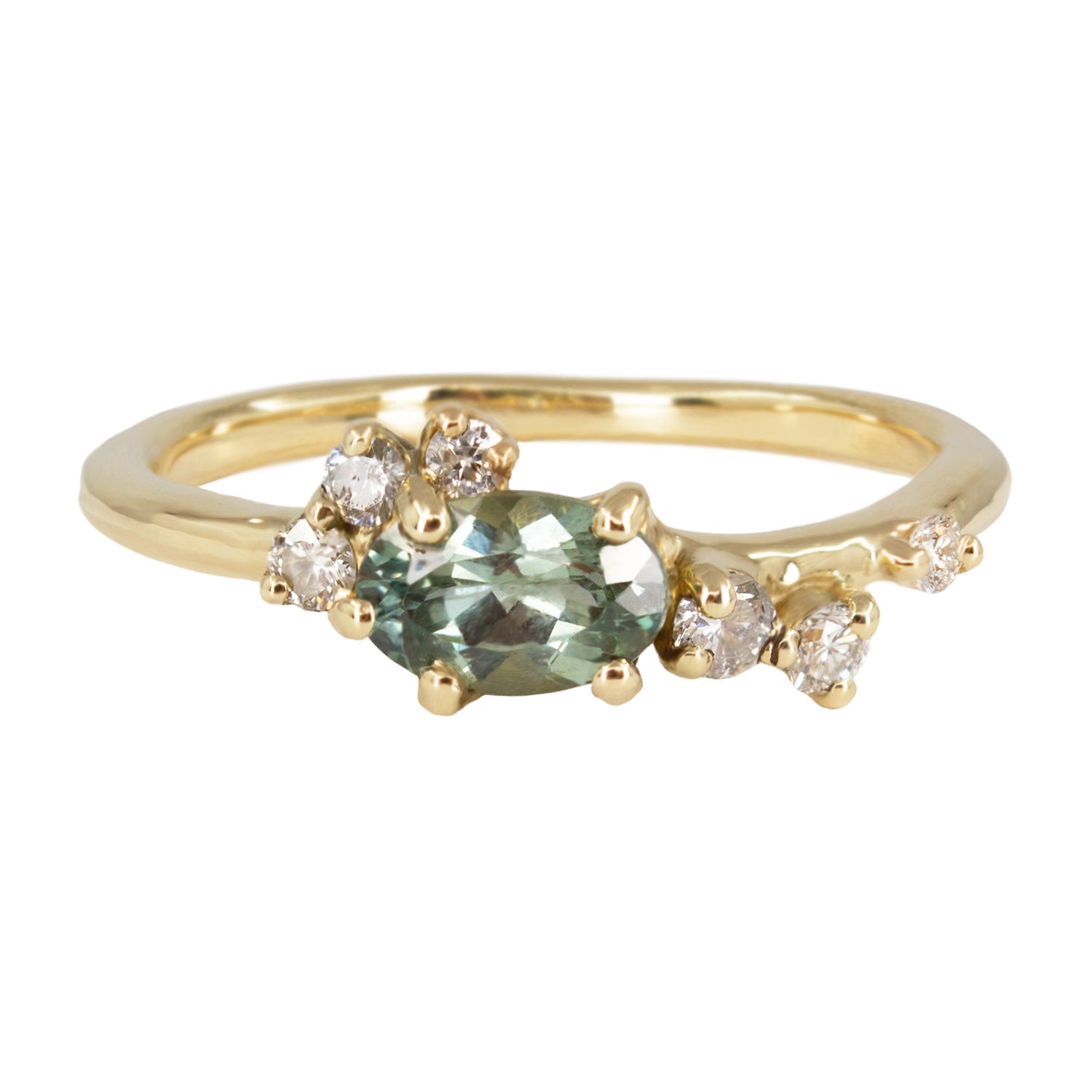 Delicate and beautiful ring featuring teal sapphire and white diamonds. Perfect option as an alternative engagement ring for a modern bride.